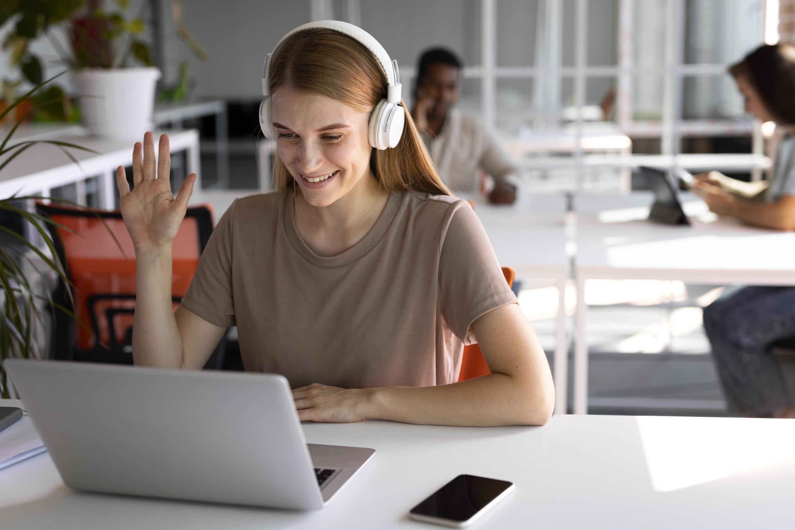 medium shot woman sitting desk scaled